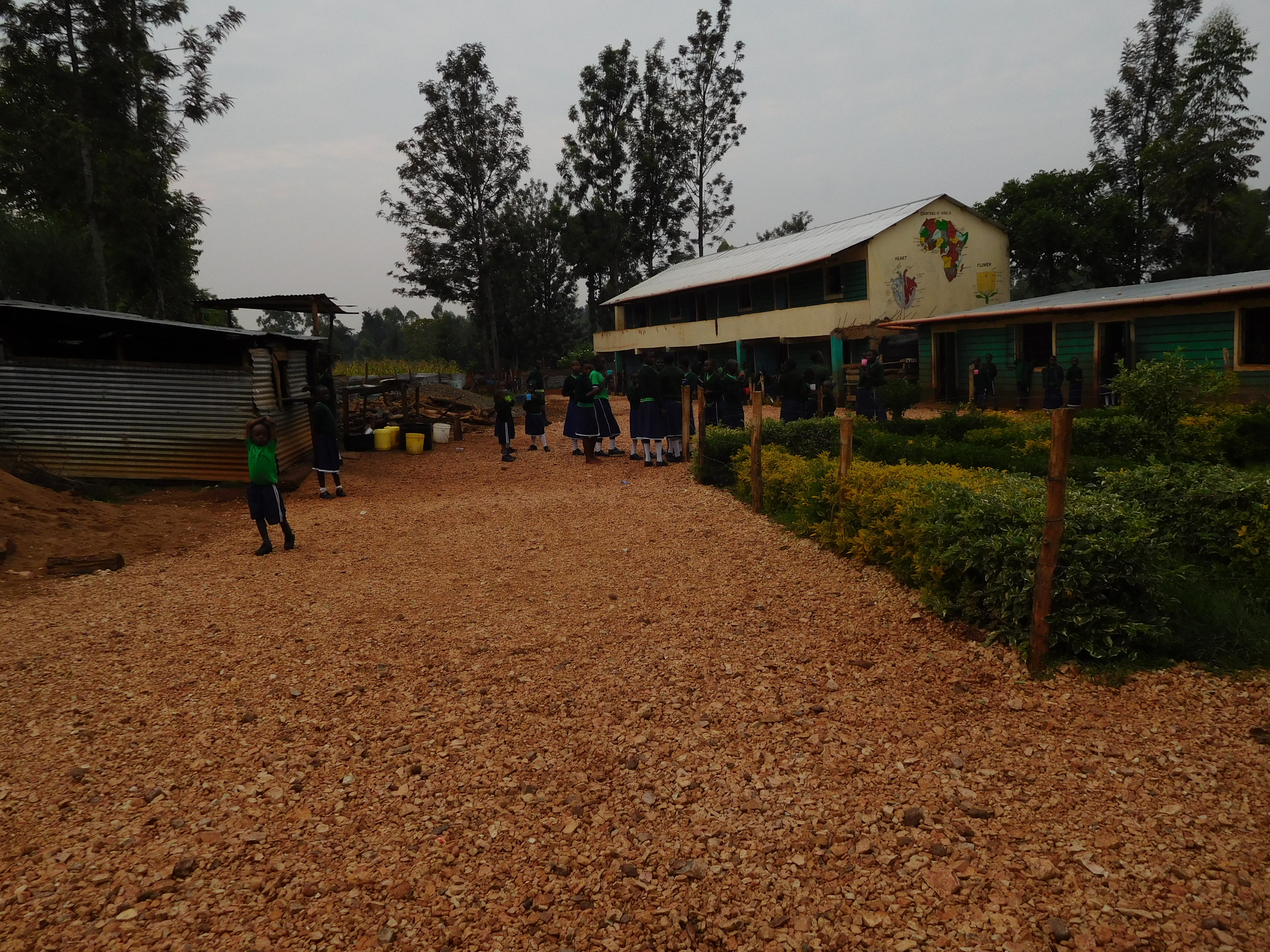 This is a view of our Assembly Field at W.A. You can also see our School kitchen on the left.